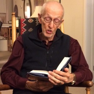 My father reading aloud (something he's done all my life—lucky me!)